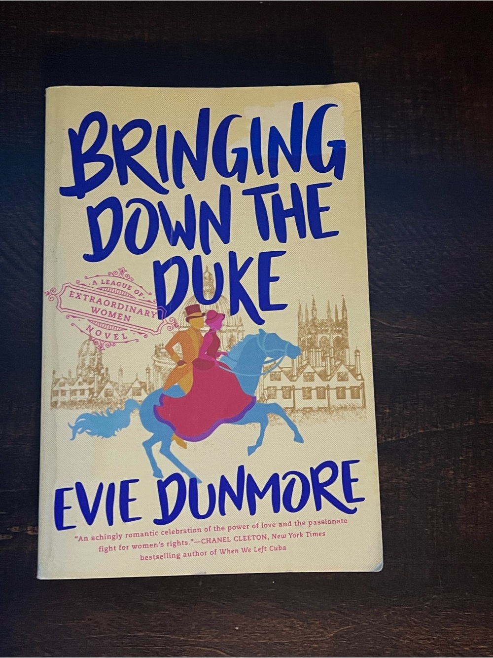 Bringing Down the Duke by Evie Dunmore - Cream Cover with Blue & Pink Artwork